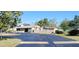 Community clubhouse with tennis courts and green spaces at 2808 60Th W Ave # 626, Bradenton, FL 34207