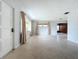 Spacious living room with light walls and terrazzo flooring at 2877 Michigan St, Sarasota, FL 34237
