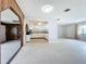 View of kitchen with white cabinets and speckled floor at 2877 Michigan St, Sarasota, FL 34237