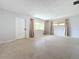 Bright living room with large windows and neutral walls at 2877 Michigan St, Sarasota, FL 34237