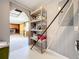 Unfinished basement area with shelving and storage at 2877 Michigan St, Sarasota, FL 34237