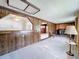 Living room with tile floors and a fireplace at 2877 Michigan St, Sarasota, FL 34237