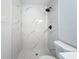 Large walk-in shower with marble tile at 2877 Michigan St, Sarasota, FL 34237