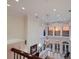 Two story living space with large windows, chandelier and sunset views at 309 Ringling Point Dr, Sarasota, FL 34234