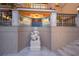 Elegant entryway with ornate detailing and a captivating statue at 309 Ringling Point Dr, Sarasota, FL 34234