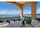 Outdoor balcony with water views and comfortable seating at 309 Ringling Point Dr, Sarasota, FL 34234