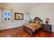 Bright bedroom with hardwood floors, large windows and water views at 309 Ringling Point Dr, Sarasota, FL 34234