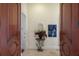 Elegant entryway with decorative accents and hardwood floors at 309 Ringling Point Dr, Sarasota, FL 34234