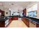 Island kitchen with stainless steel appliances and water views at 309 Ringling Point Dr, Sarasota, FL 34234