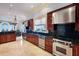 Kitchen with stainless steel appliances and granite countertops at 309 Ringling Point Dr, Sarasota, FL 34234