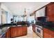 Eat-in kitchen with stainless steel appliances and views of the water at 309 Ringling Point Dr, Sarasota, FL 34234