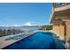 Gorgeous waterfront home with a private dock and inviting swimming pool at 309 Ringling Point Dr, Sarasota, FL 34234