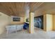Covered pool bar area with mural and comfortable seating at 309 Ringling Point Dr, Sarasota, FL 34234