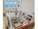 High-ceiling living room with ample seating and water views at 309 Ringling Point Dr, Sarasota, FL 34234