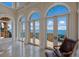 Stunning water views from expansive windows and French doors at 309 Ringling Point Dr, Sarasota, FL 34234