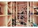 Custom-built wine cellar with extensive shelving at 309 Ringling Point Dr, Sarasota, FL 34234