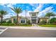 Modern community clubhouse with palm trees and landscaping at 4734 Tortona Ct, Bradenton, FL 34211