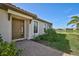 Front entry with paver walkway & landscaping at 4734 Tortona Ct, Bradenton, FL 34211