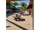 Outdoor BBQ and picnic area with tables and benches at 475 Benjamin Franklin Dr # 202, Sarasota, FL 34236
