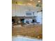 Well-equipped kitchen with granite counters and white cabinets at 475 Benjamin Franklin Dr # 202, Sarasota, FL 34236