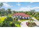 Luxury home with circular driveway and beautifully landscaped yard at 5156 Little Brook Ct, Sarasota, FL 34238