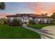 Stunning curb appeal with a beautifully landscaped yard at 5156 Little Brook Ct, Sarasota, FL 34238