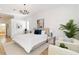 Spacious main bedroom with king-size bed and sitting area at 5156 Little Brook Ct, Sarasota, FL 34238