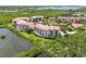 Luxury waterfront condo community with lush landscaping at 5450 Eagles Point Cir # 405, Sarasota, FL 34231