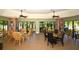 Relaxing community room with library and seating at 5450 Eagles Point Cir # 405, Sarasota, FL 34231