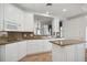 Modern kitchen with granite countertops and island at 5450 Eagles Point Cir # 405, Sarasota, FL 34231