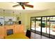 Community kitchen with modern appliances and pool views at 5450 Eagles Point Cir # 405, Sarasota, FL 34231