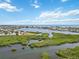 Waterfront view showcasing a beautiful coastline at 5450 Eagles Point Cir # 405, Sarasota, FL 34231