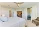 Bright bedroom with access to private balcony and en-suite bathroom at 5514 Tidal Breeze Cv, Bradenton, FL 34211