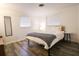 Bedroom with double bed, nightstand, and large window at 560 Bradenton Rd, Venice, FL 34293