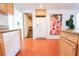 Kitchen with wood cabinets, granite countertops, and modern appliances at 560 Bradenton Rd, Venice, FL 34293