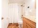 Clean bathroom with tub, shower, and granite vanity at 560 Bradenton Rd, Venice, FL 34293