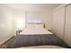 Cozy bedroom with a double bed, nightstand, and ample closet space at 560 Bradenton Rd, Venice, FL 34293