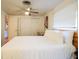 Spacious bedroom with a ceiling fan and large closet at 560 Bradenton Rd, Venice, FL 34293