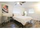 Well-lit bedroom with a workspace and wood floors at 560 Bradenton Rd, Venice, FL 34293