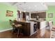 Updated kitchen with breakfast bar and wine rack at 7917 Broadmoor Pines Blvd, Sarasota, FL 34243