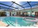 Sparkling pool with spa and spacious patio at 7917 Broadmoor Pines Blvd, Sarasota, FL 34243