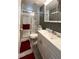 Bathroom with shower/tub combo and updated vanity at 8 White Oak Ter, Sarasota, FL 34237