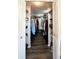 Large walk-in closet with ample storage space at 8 White Oak Ter, Sarasota, FL 34237