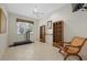 Home exercise room with treadmill and bookcases at 8128 Collingwood Ct, University Park, FL 34201