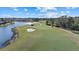 Golf course with lush fairways and water features at 8128 Collingwood Ct, University Park, FL 34201