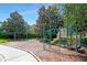 Community playground with swings and playset at 8277 Villa Grande Ct, Sarasota, FL 34243