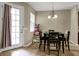 Breakfast nook with table and chairs, near kitchen and back door at 8277 Villa Grande Ct, Sarasota, FL 34243