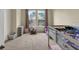 Bedroom with full and twin beds and large windows at 8277 Villa Grande Ct, Sarasota, FL 34243