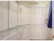 Large walk-in closet with wire shelving and hanging rods at 9506 Royal Calcutta Pl, Lakewood Ranch, FL 34202