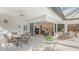 Covered patio with seating area, providing a seamless indoor-outdoor flow at 9506 Royal Calcutta Pl, Lakewood Ranch, FL 34202